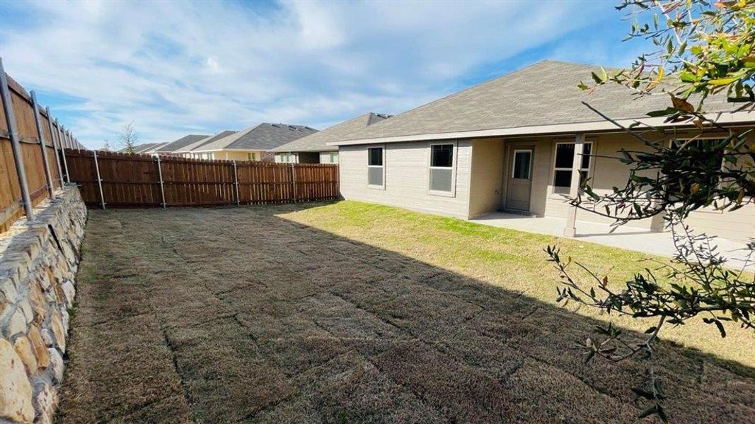 Yard - D.R. Horton's Kingston Floorplan Elevation C - All Home and community information, including pricing, included features, terms, availability and amenities, are subject to change at any time without notice or obligation. All Drawings, pictures, photographs, video, square footages, floor plans, elevations, features, colors and sizes are approximate for illustration purposes only and will vary from the homes as built. Yard - D.R. Horton's Kingston Floorplan Elevation C - All Home and community information, including pricing, included features, terms, availability and amenities, are subject to change at any time without notice or obligation. All Drawings, pictures, photographs, video, square footages, floor plans, elevations, features, colors and sizes are approximate for illustration purposes only and will vary from the homes as built.