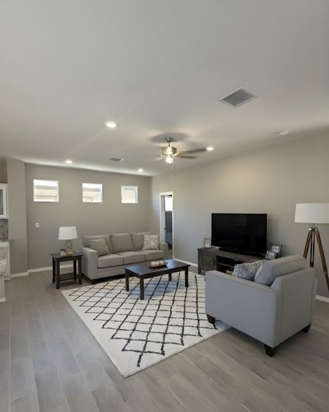 Representative furnished interior of a home built from the Athena 1599 SM by Saratoga Homes in Crossland, El Paso (Image 3).