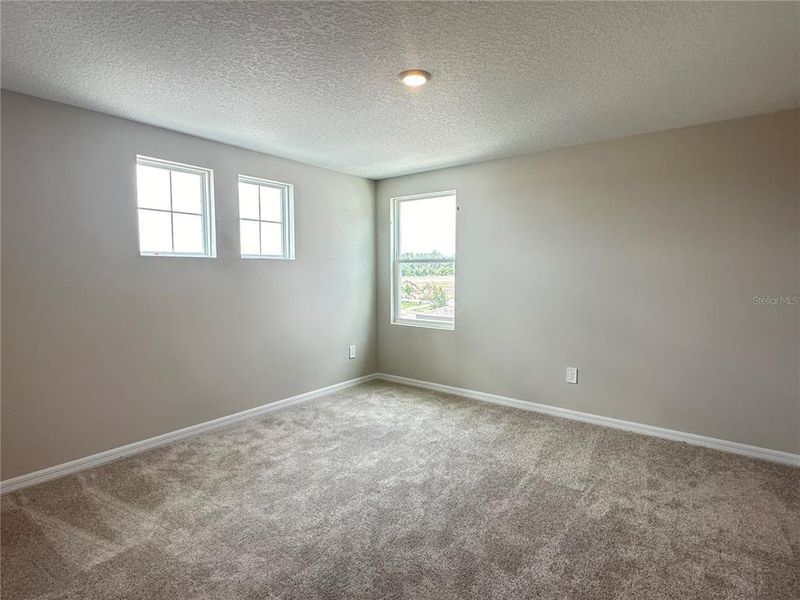 Spacious, unfurnished interior of a new home in Berry Bay, Wimauma (Image 35).
