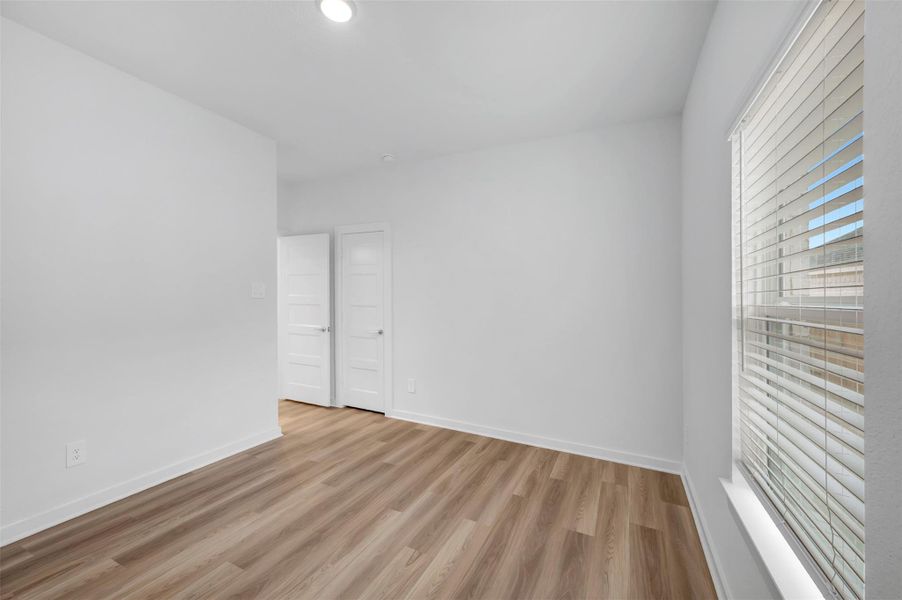 Spacious, unfurnished interior of a new home in Wildrye, Waller (Image 19).