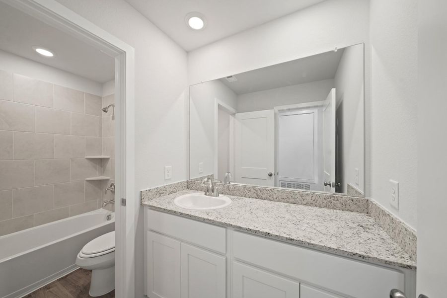 Furnished interior view inside a new home in Lonestar Collection at Paloma at Sanford Farms, Waller (Image 4).