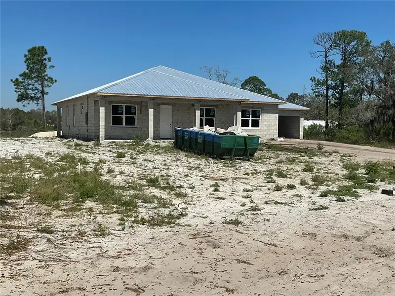 Exterior details and patio area of a home in , Deltona (Image 13).