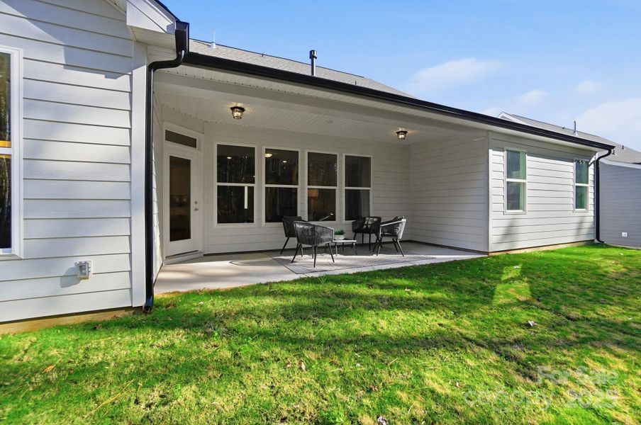 Exterior details and patio area of a home in Rone Creek, Waxhaw (Image 26).