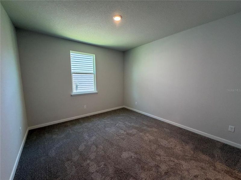 Spacious, unfurnished interior of a new home in Reserve East, Flagler Beach (Image 34).