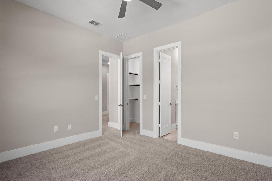 A comfortable bedroom with ample storage space for a tranquil retreat. A comfortable bedroom with ample storage space for a tranquil retreat.
