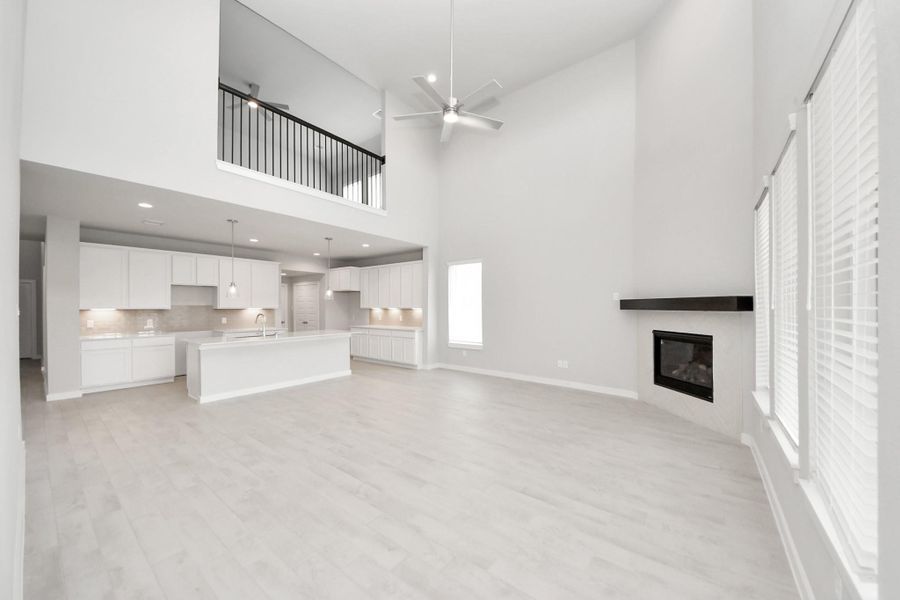 Take another glimpse into the heart of the home with this additional view of the family room—a sprawling space ready to accommodate all your gatherings. Sample photo of completed home with similar floor plan. Actual colors and selections may vary. Take another glimpse into the heart of the home with this additional view of the family room—a sprawling space ready to accommodate all your gatherings. Sample photo of completed home with similar floor plan. Actual colors and selections may vary.