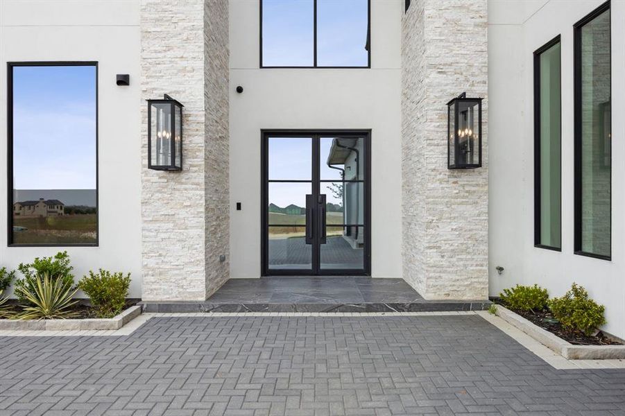 Exterior details and patio area of a home in Avadene at Las Colinas, Irving (Image 20).