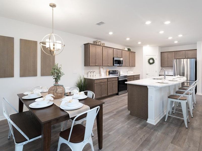 Or, opt for the alternate kitchen option with a large linear island - Wesley II by Highland Homes Or, opt for the alternate kitchen option with a large linear island - Wesley II by Highland Homes