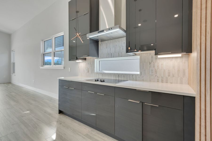 Representative furnished interior of a home built from the Marbella by ABD Development in Hampton Green at Providence, Davenport (Image 9).