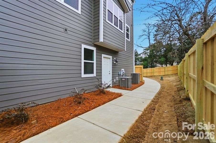 Exterior details and patio area of a home in , Charlotte (Image 26). Exterior details and patio area of a home in , Charlotte (Image 26).