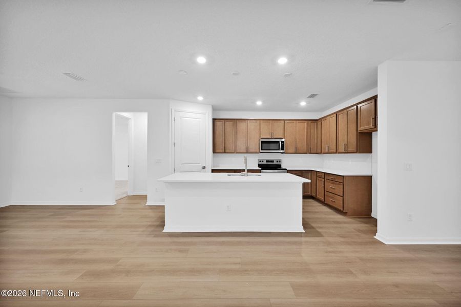 Furnished interior view inside a new home in Hyland Trail, Green Cove Springs (Image 7).