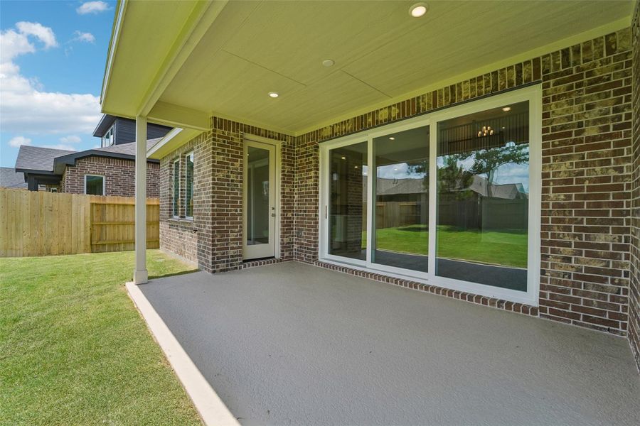 Exterior details and patio area of a home in Evergreen 55', Conroe (Image 26). Exterior details and patio area of a home in Evergreen 55', Conroe (Image 26).