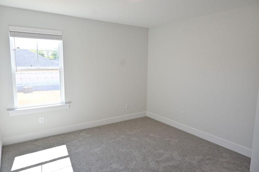 Spacious, unfurnished interior of a new home in Rookers Bend, Smyrna (Image 36).