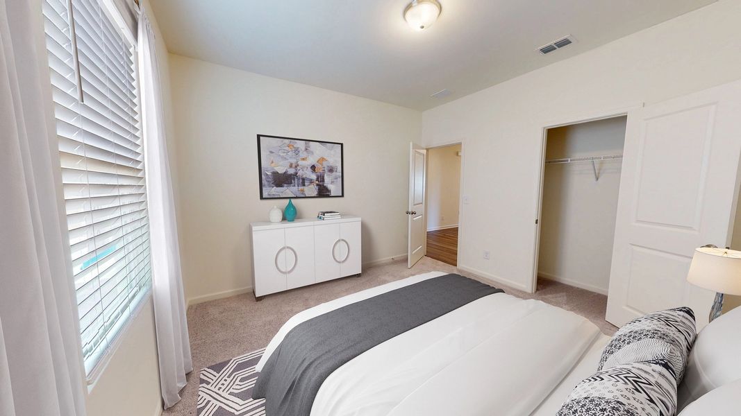 Representative furnished interior of a home built from the Equinox by Starlight Homes in Oakfield Lakes, Parrish (Image 7).