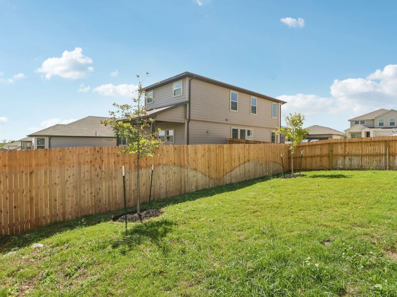 Back exterior of the Callaghan floorplan at a Meritage Homes community.