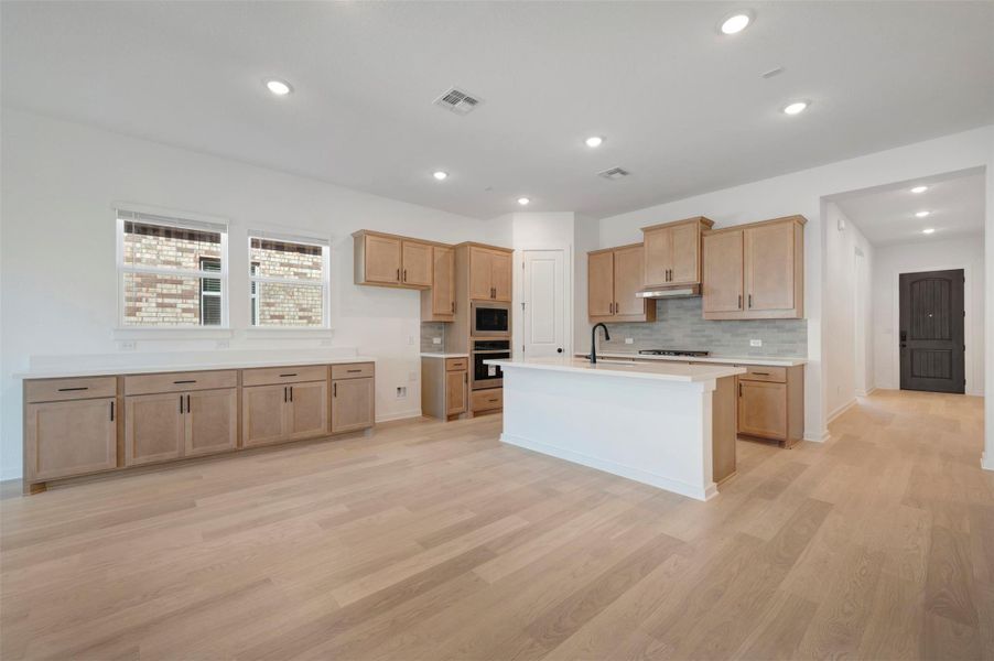 Furnished interior view inside a new home in Heritage, Dripping Springs (Image 7).