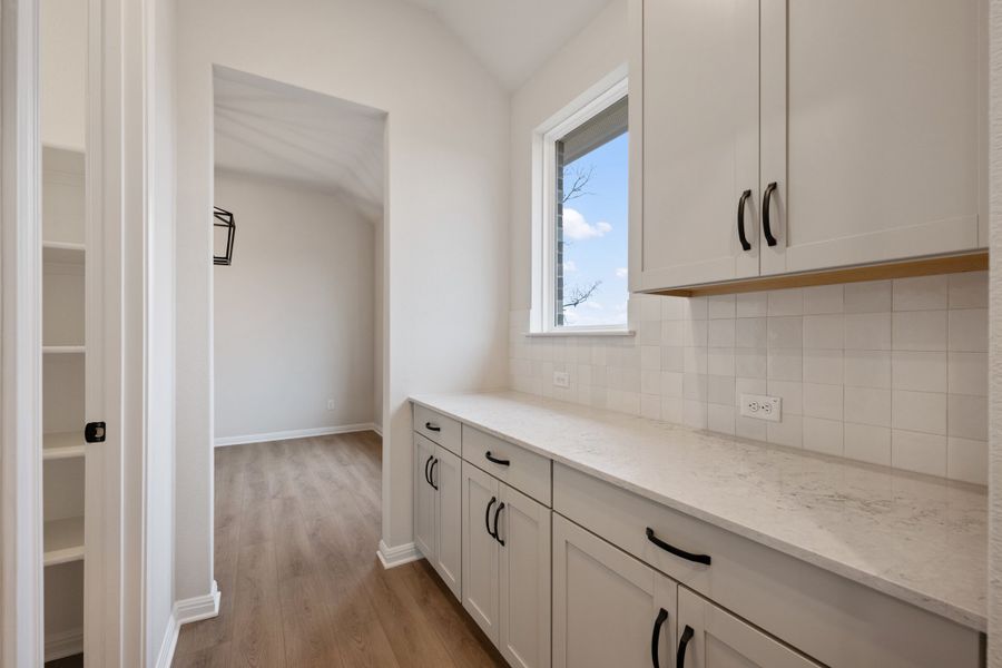 Representative furnished interior of a home built from the Carolina by Ashton Woods in The Estates at La Cima, San Marcos (Image 11). Representative furnished interior of a home built from the Carolina by Ashton Woods in The Estates at La Cima, San Marcos (Image 11).