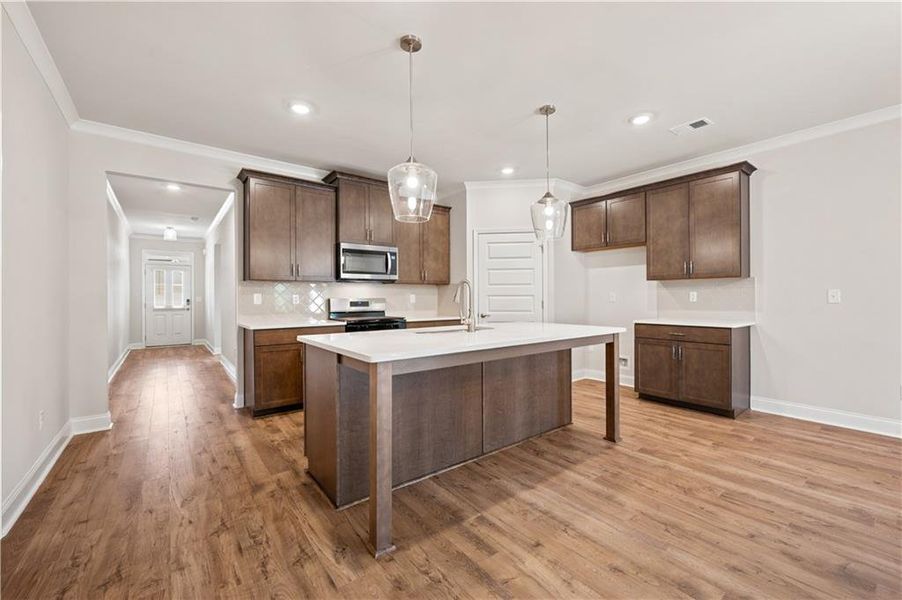 Furnished interior view inside a new home in Oak Ridge Meadows - Active Adult, Locust Grove (Image 9).