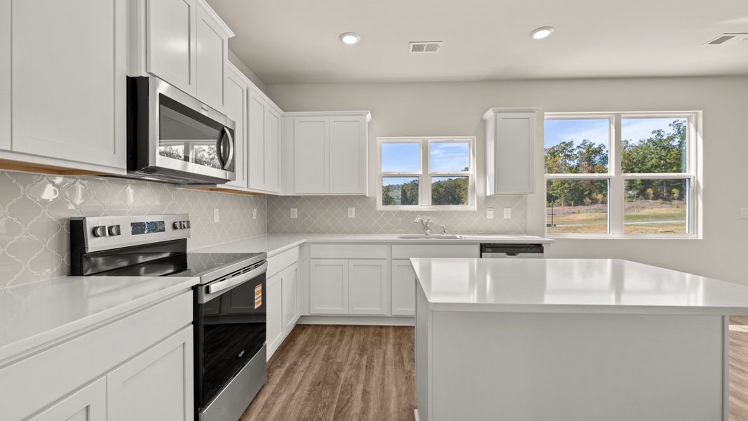 Representative furnished interior of a home built from the Packard by D.R. Horton in Locust Grove Station - Cedar Ridge, Locust Grove (Image 4).