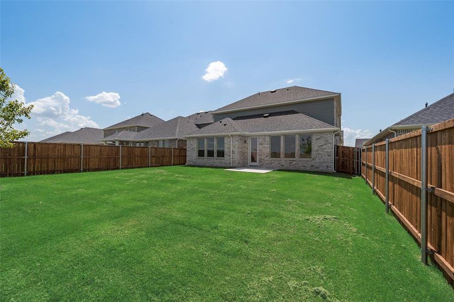 Front exterior of a new home in Arbors at Legacy Hills, Celina, TX, highlighting curb appeal (Image 18). Front exterior of a new home in Arbors at Legacy Hills, Celina, TX, highlighting curb appeal (Image 18).