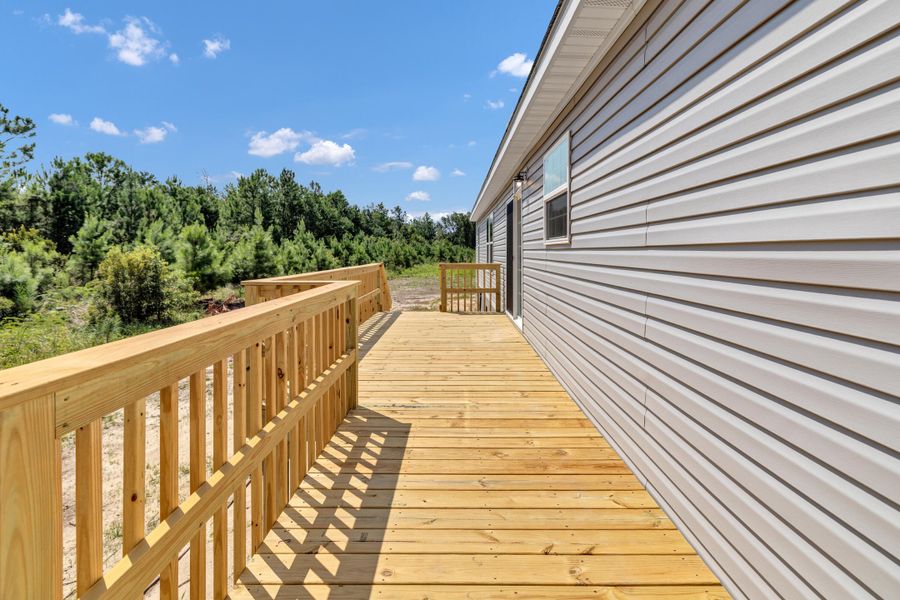 Front exterior of a new home in , Cross, SC, highlighting curb appeal (Image 25).