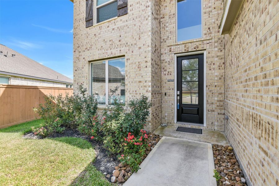Front exterior of a new home in , Hockley, TX, highlighting curb appeal (Image 24).