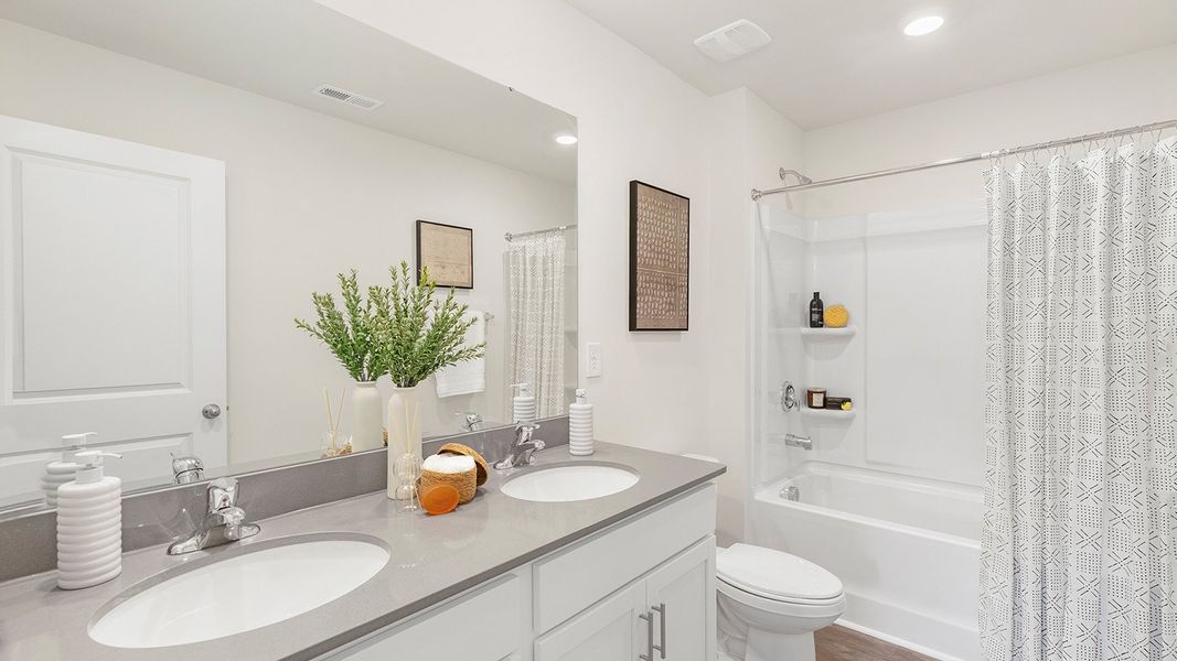 Furnished interior view inside a new home in Reedy Creek Preserve, Charlotte (Image 21).