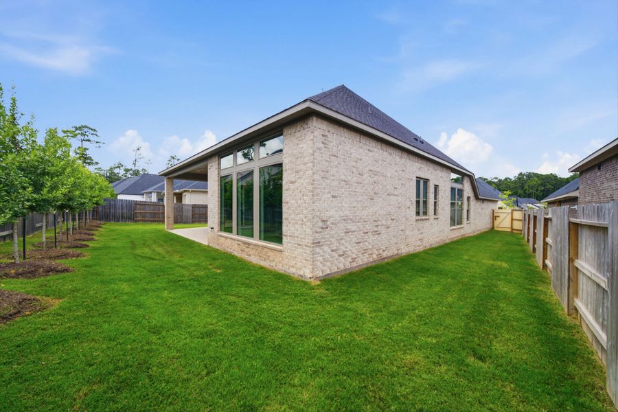 Exterior details and patio area of a home in Audubon 60′, Magnolia (Image 3).