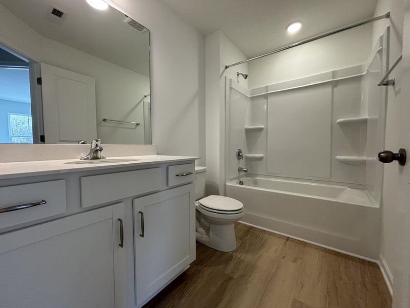 Furnished interior view inside a new home in CraigStone, Woodruff (Image 7).
