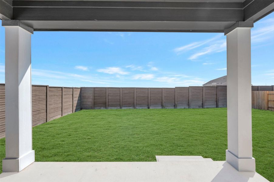 Exterior details and patio area of a home in Willow Springs, Buda (Image 3).