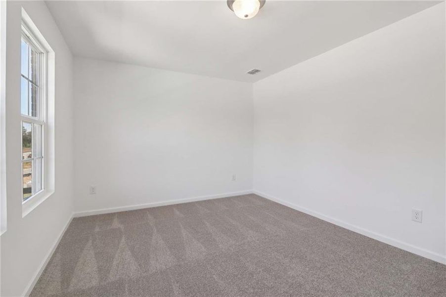 Spacious, unfurnished interior of a new home in The Pointe at Heron Bay, Locust Grove (Image 24).