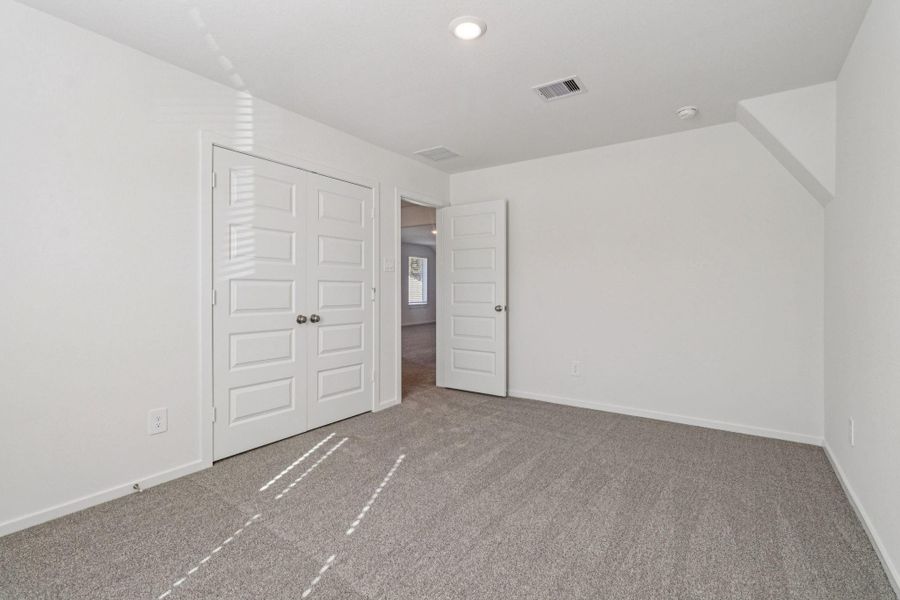 Spacious, unfurnished interior of a new home in Sundance Cove - Traditional Series, Crosby (Image 34).