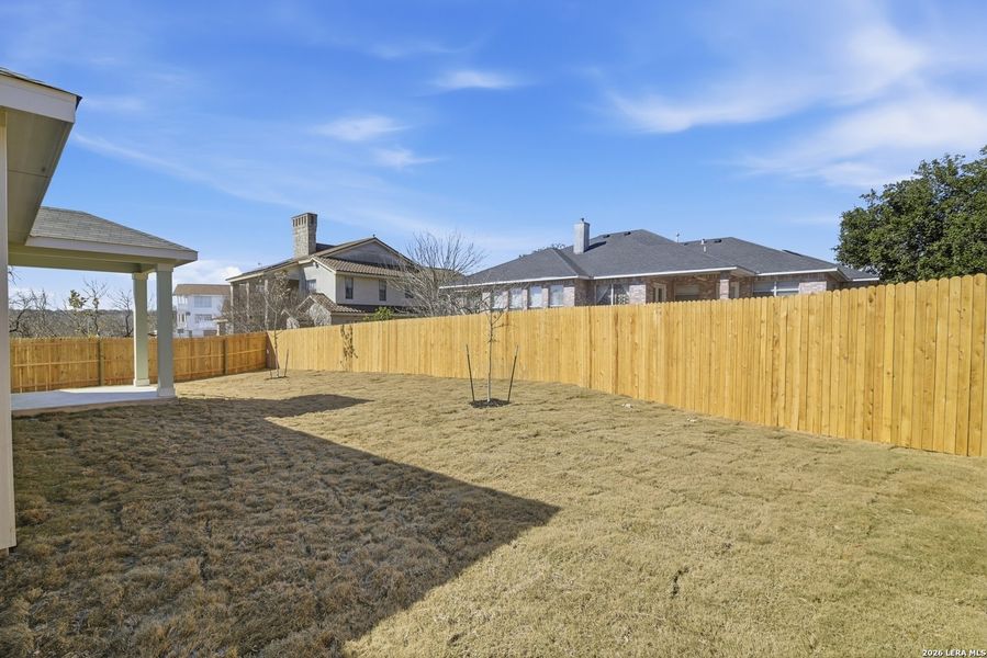 Exterior details and patio area of a home in Fairway Crossing, Converse (Image 4).