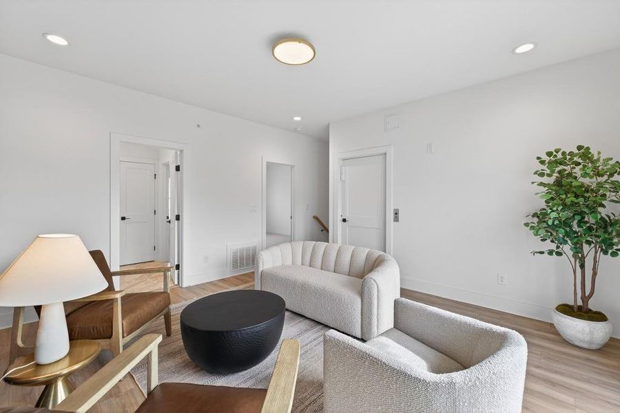 Furnished interior view inside a new home in Skyview On Broad, Sugar Hill (Image 34). Furnished interior view inside a new home in Skyview On Broad, Sugar Hill (Image 34).