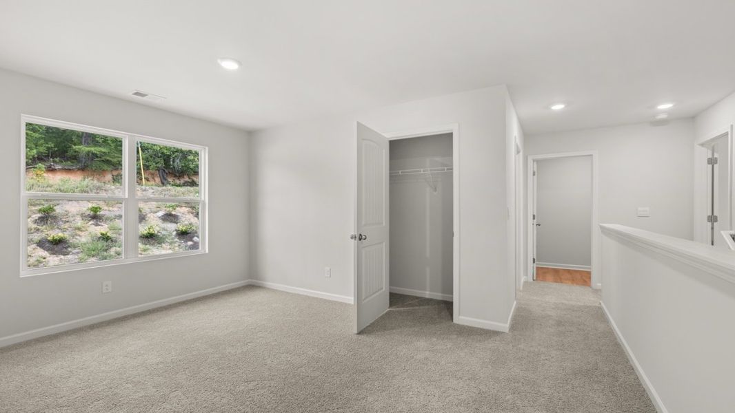 Representative unfurnished interior of a home built from the Hayden by D.R. Horton in South Wind, South Fulton (Image 23).