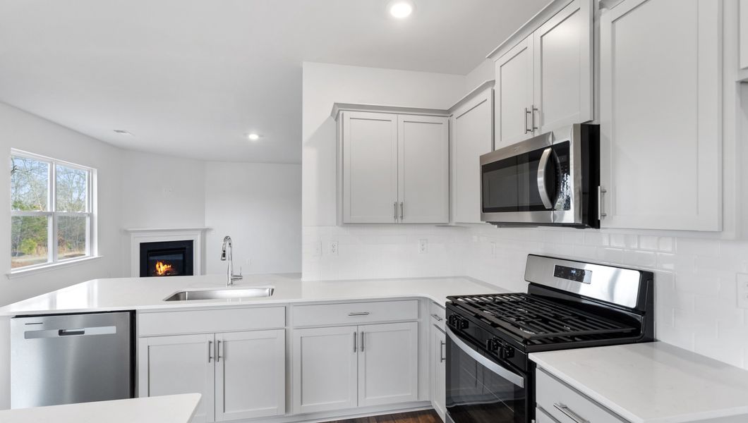 Representative furnished interior of a home built from the WILMINGTON by D.R. Horton in Baxter Village, Boiling Springs (Image 8).