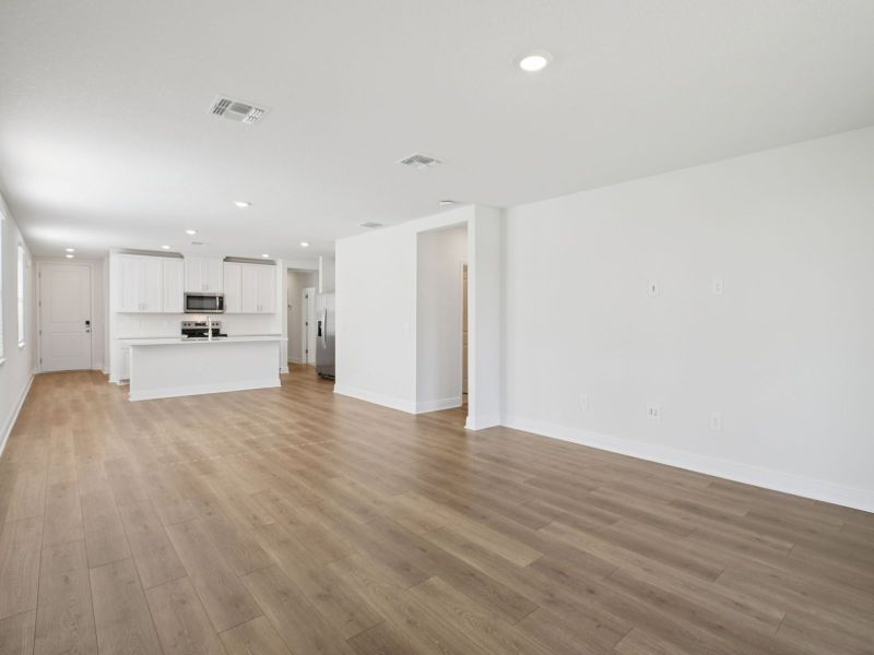 Spacious, unfurnished interior of a new home in The Reserve at Hammock Oaks - Classic Series, Lady Lake (Image 10).