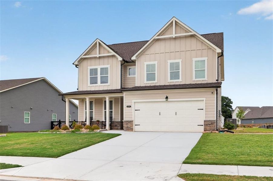 Front exterior of a new home in , Hoschton, GA, highlighting curb appeal (Image 25). Front exterior of a new home in , Hoschton, GA, highlighting curb appeal (Image 25).