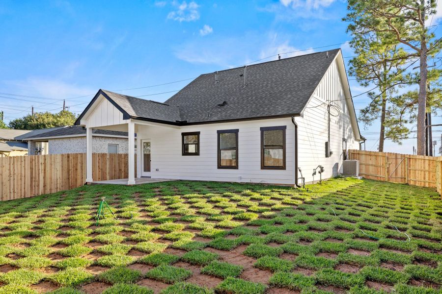 Front exterior of a new home in , Needville, TX, highlighting curb appeal (Image 12).