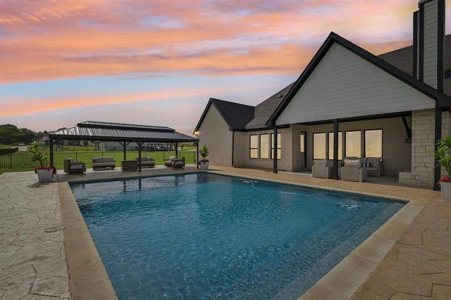 Exterior details and patio area of a home in King Crossing Estates, Van Alstyne (Image 23). Exterior details and patio area of a home in King Crossing Estates, Van Alstyne (Image 23).