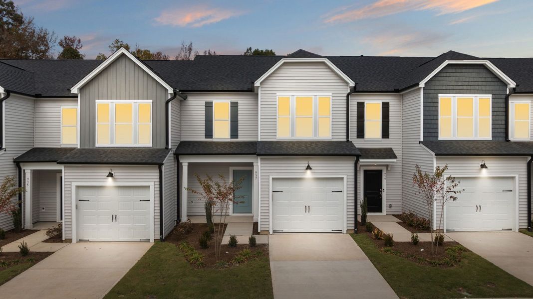 Front exterior of a new home in Poets Walk, Whitsett, NC, highlighting curb appeal (Image 17).