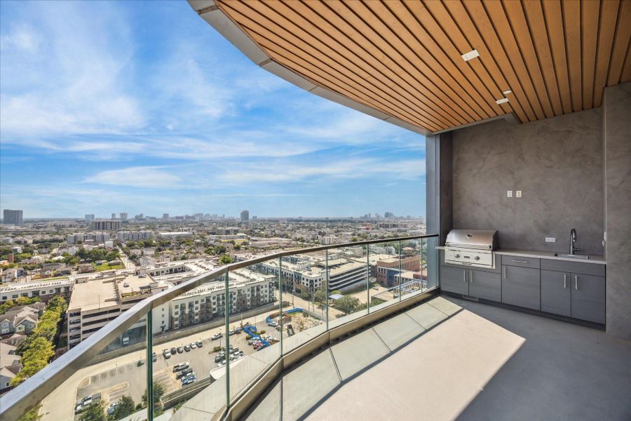 Exterior details and patio area of a home in Residences At The Allen, Houston (Image 2).