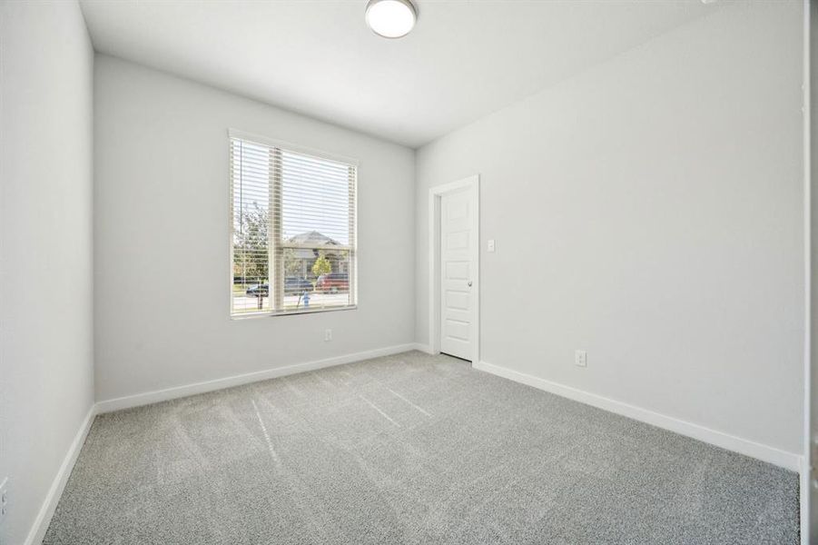 Bedroom in the Emmy II home plan by Trophy Signature Homes - REPRESENTATIVE PHOTO