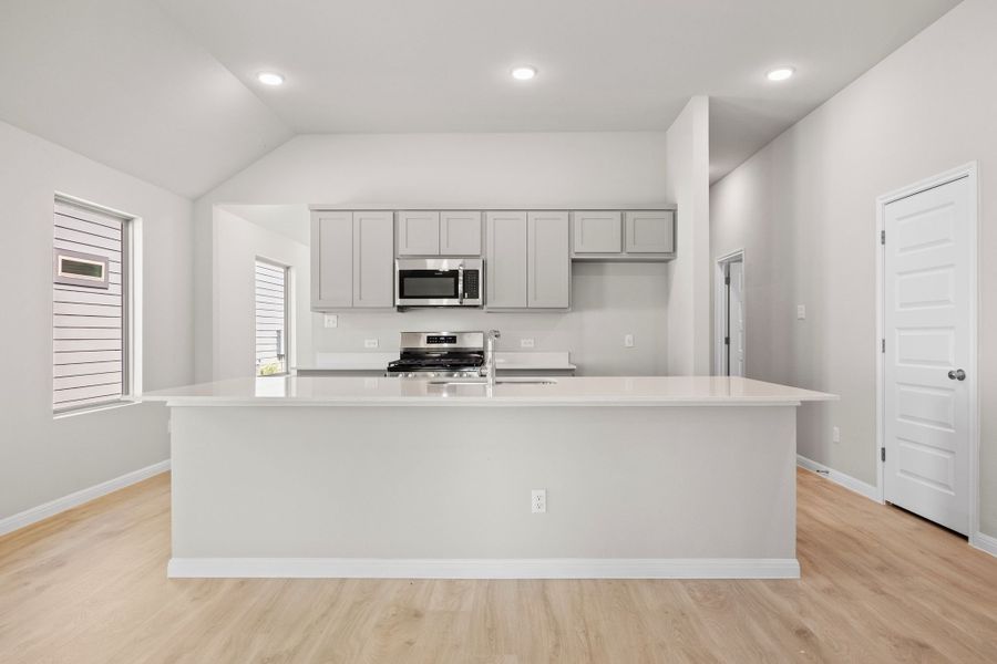 Kitchen in the Spruce home plan by Trophy Signature Homes - REPRESENTATIVE PHOTO Kitchen in the Spruce home plan by Trophy Signature Homes - REPRESENTATIVE PHOTO