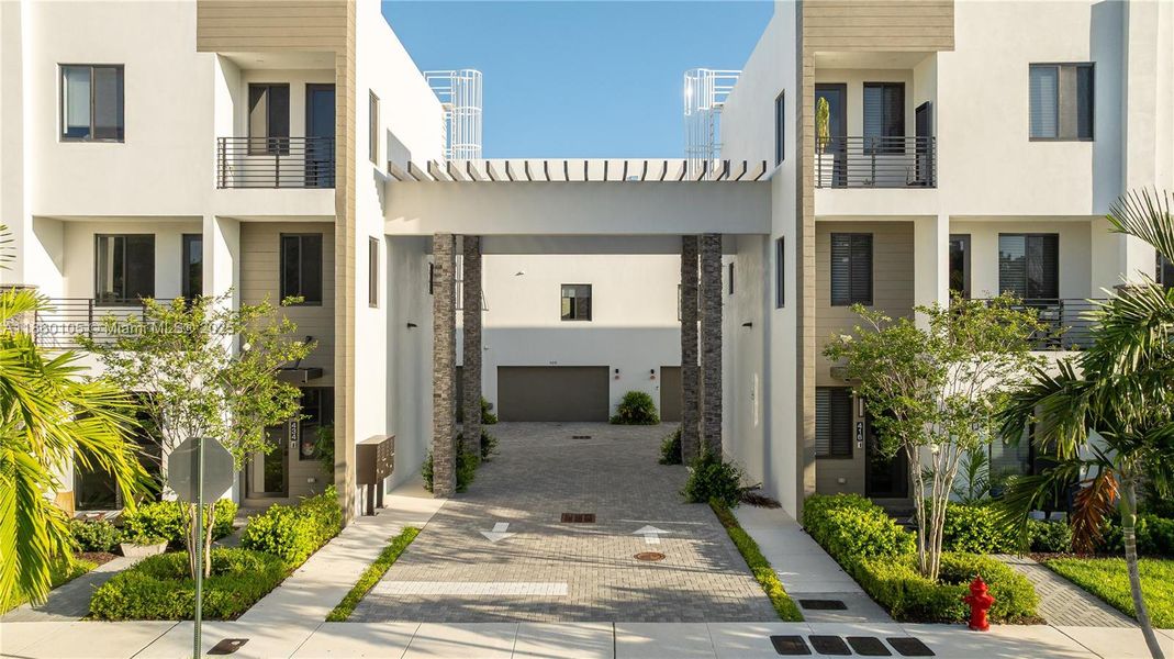 Front exterior of a new home in , Fort Lauderdale, FL, highlighting curb appeal (Image 18). Front exterior of a new home in , Fort Lauderdale, FL, highlighting curb appeal (Image 18).