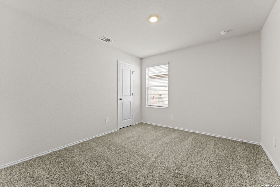 Spacious, unfurnished interior of a new home in Navarro Fields, Seguin (Image 23).