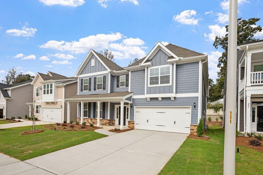 Front exterior of a new home in Georgias Landing, Raleigh, NC, highlighting curb appeal (Image 21).