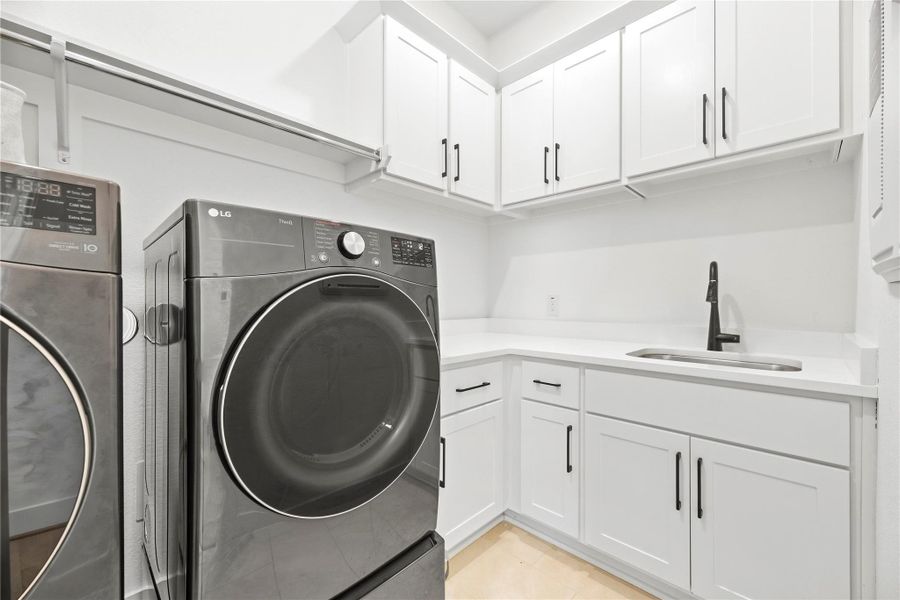 Furnished interior view inside a new home in Sienna, Missouri City (Image 17).