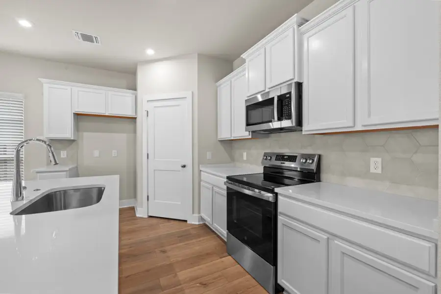 Representative furnished interior of a home built from the Riley by Omega Builders in Hartrick Ranch, Temple (Image 5).
