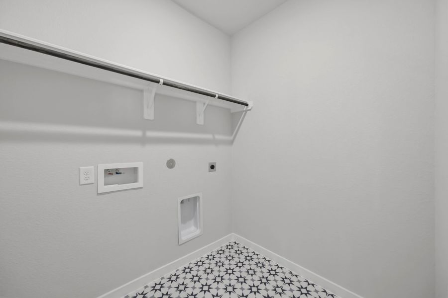 Spacious, unfurnished interior of a new home in Sunterra 40, Katy (Image 23).